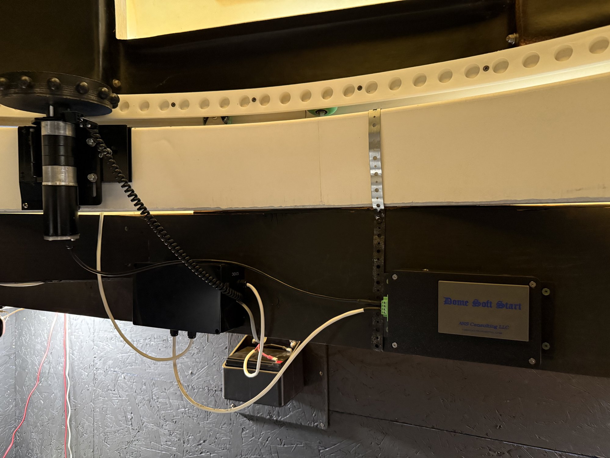 The dome rotation drive, MaxDome II control wiring, and the Dome Soft Start module from ANS Consulting mounted on the dome ring