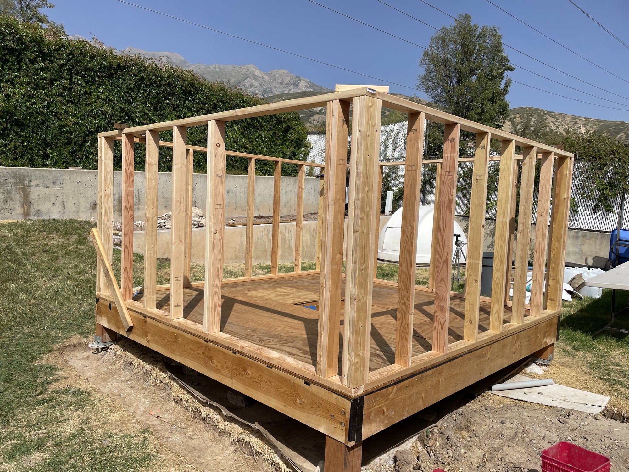 The observatory walls framed up on the finished floor deck, with the Exploradome waiting nearby